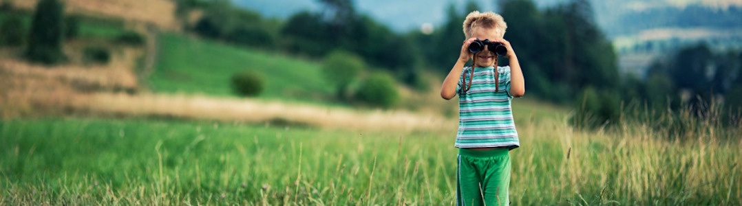 child with binoculars